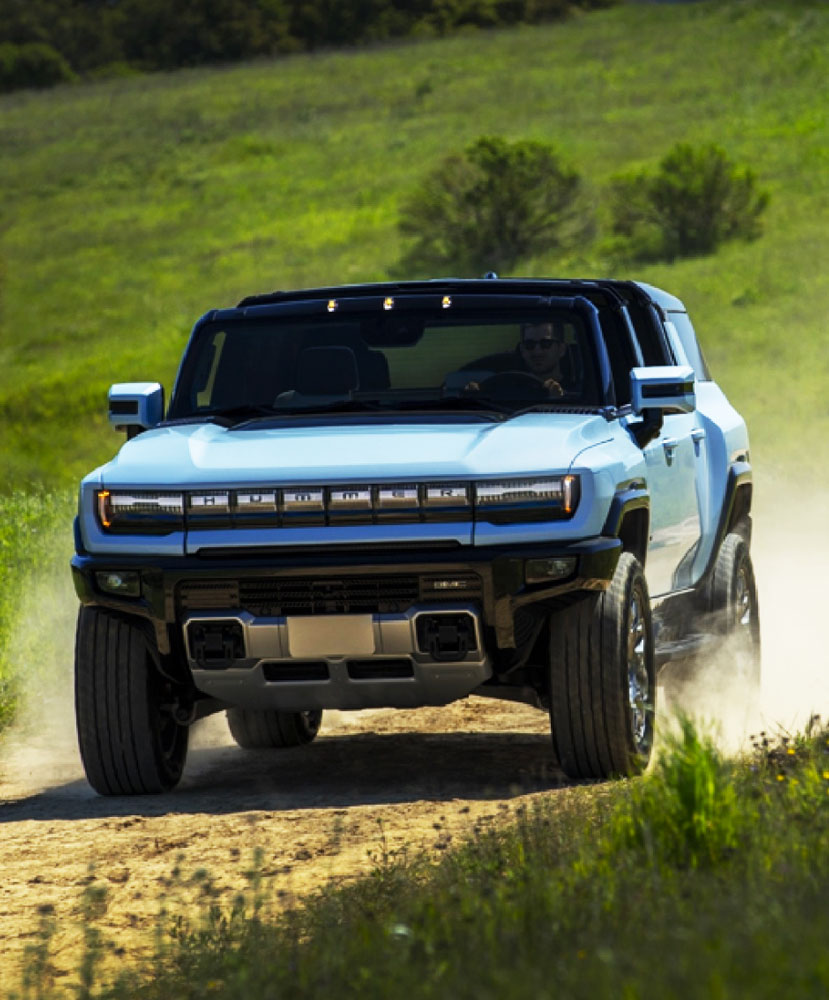 Hummer EV driving 